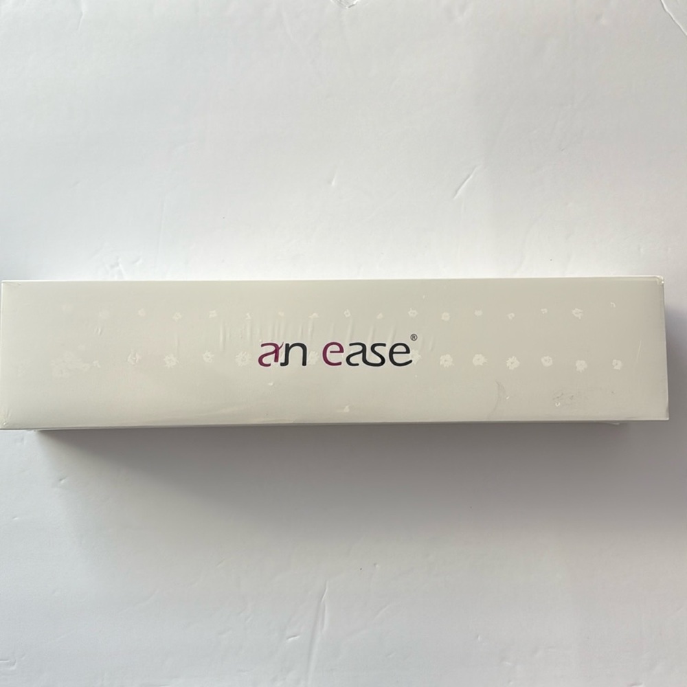 An Ease Magic Wand Massager brand-new in box. SEALED